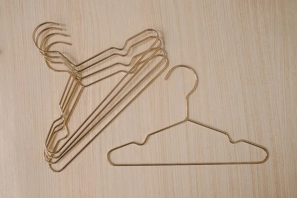 Hangers in a clothing store.