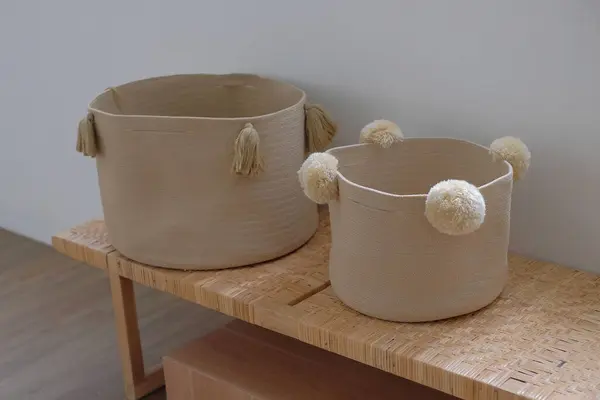 children's clothes basket with a cute model