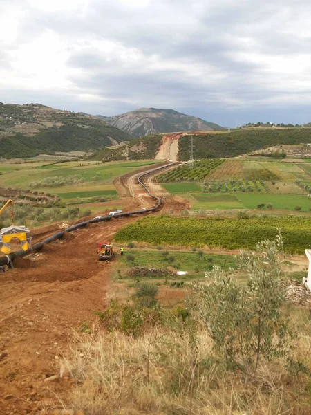 A line pipe on Cross-country pipeline installation through mountains southeastern Europe, Albania