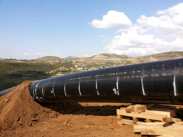 A line pipe on Cross-country pipeline installation through mountains southeastern Europe, Albania