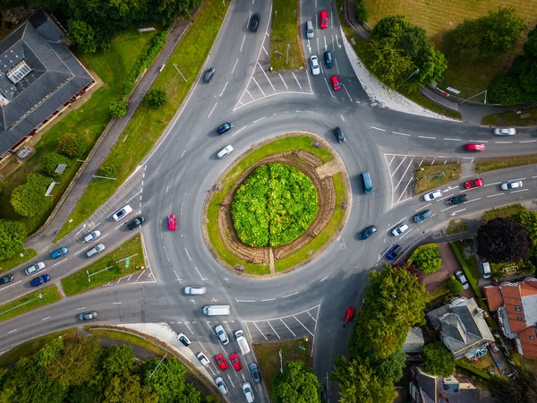 Aerial view of Lawnswood Roundabout on the Leeds Ring Road. Cars approaching the roundabout junction and travelling around the British roundabout clockwise.