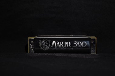 Harmonica on a black background