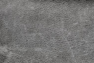 Buruşuk gerçek deri kaplama, gri siyah renk, kırışıklıklar, mat yüzey, modaya uygun arka plan.