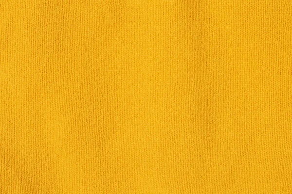 ニットテクスチャクローズアップ、明るい黄色、背景 — ストック写真