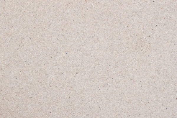 Natural craft paper texture, light grey cardboard background close-up — Stock Photo, Image