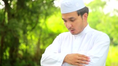 Asian white islam man prayer,Young Muslim praying,Ramadan festival concept - Closed up