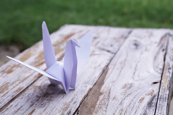 The origami bird is believed to be a sacred bird and a symbol of longevity, hope, good luck and peace.