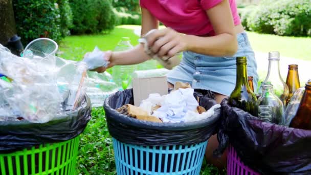 Young Woman Sorting Papper Trash Yard House — 图库视频影像