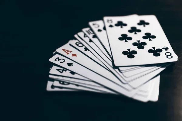 playing cards on a black background