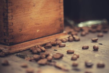 Black coffee in the morning with a Drip coffee method equipment lay on wooden table.