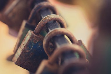 Close up of rusty door lock and toned in vintage style.