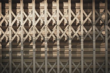 Closeup photo of technological metal structure. Creative abstract of modern architecture designed from steel. Toned in vintage color.