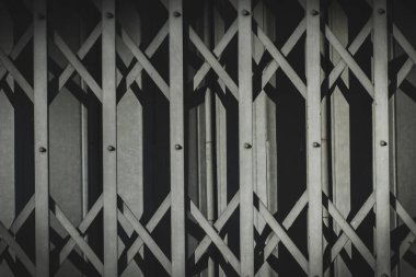 Closeup photo of technological metal structure. Creative abstract of modern architecture designed from steel. Toned in vintage color.