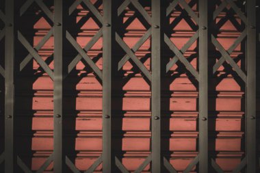 Closeup photo of technological metal structure. Creative abstract of modern architecture designed from steel. Toned in vintage color.
