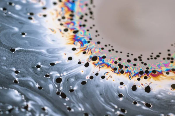 A Beautiful psychedelic abstraction formed by light on the surface of a soap bubble