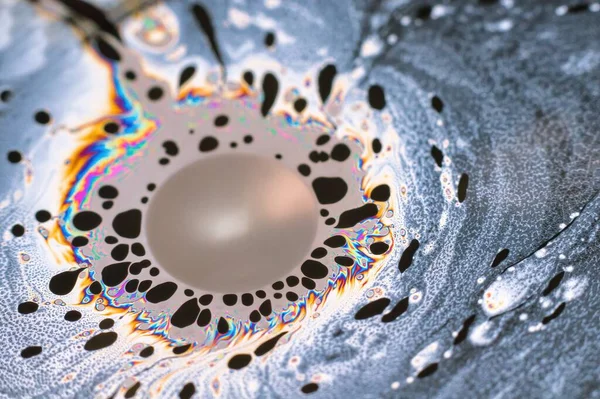 A Beautiful psychedelic abstraction formed by light on the surface of a soap bubble