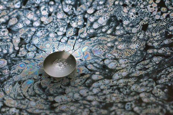 A Beautiful psychedelic abstraction formed by light on the surface of a soap bubble