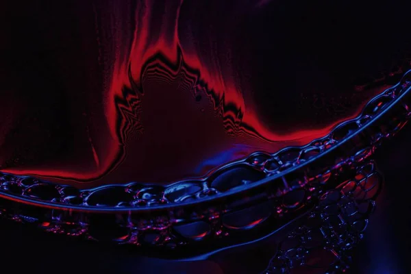 A Beautiful psychedelic abstraction formed by light on the surface of a soap bubble