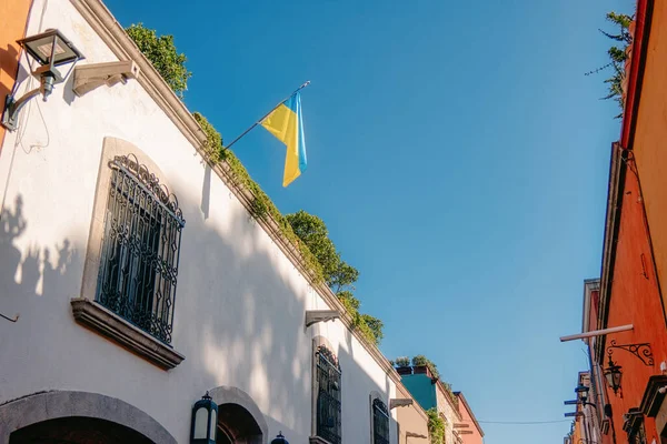 A Mexico house with ukrainian flag
