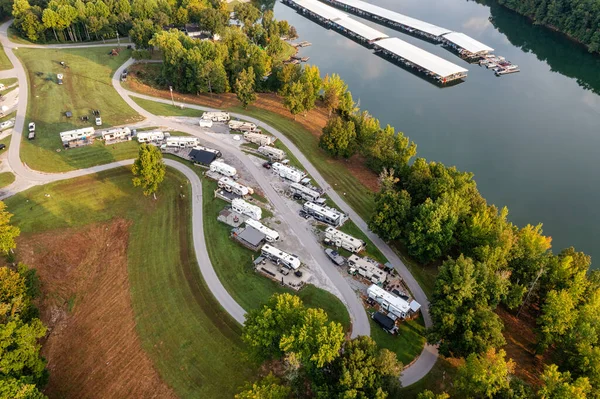 Aerial drone view of an RV motor home camp site, marina boat sto