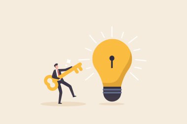 Unlock new business idea, invent new product or creativity concept, Businessman holding golden key about to insert into key hold on lightbulb idea lamp.