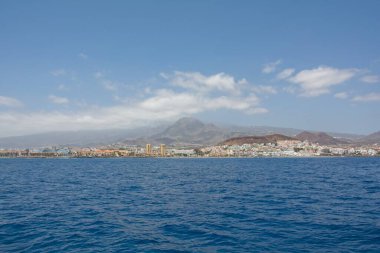 Coastline with town, ship and mountains from south coast of Canary Island Tenerife, Los Cristianos, Spain, Europe