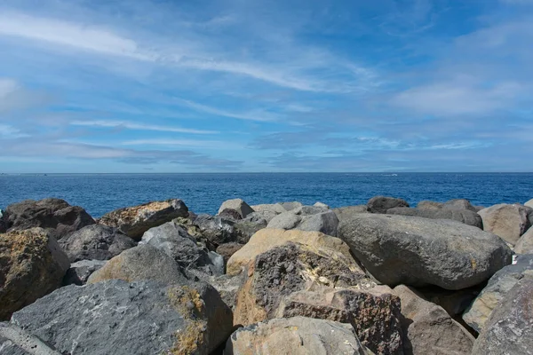 Large Boulders Front Open Sea Blue Sky Clouds — Stock Fotó