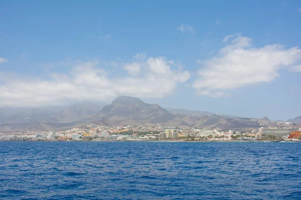 Coastline with town and mountains of the south coast of the Canary Island of Tenerife, Los Cristianos, Spain, Europe