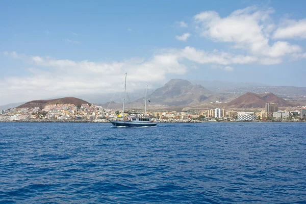 Coastline with town, ship and mountains from south coast of Canary Island Tenerife, Los Cristianos, Spain, Europe