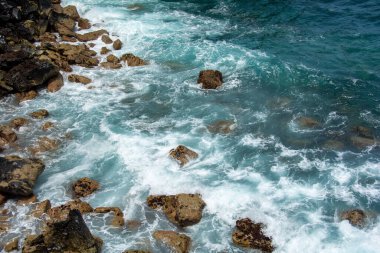 Rocks in the breakers on the coast of the Canary Island of Tenerife, Spain