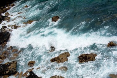 Rocks in the breakers on the coast of the Canary Island of Tenerife, Spain