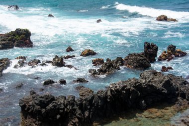 Rocks in the breakers on the coast of the Canary Island of Tenerife, Spain