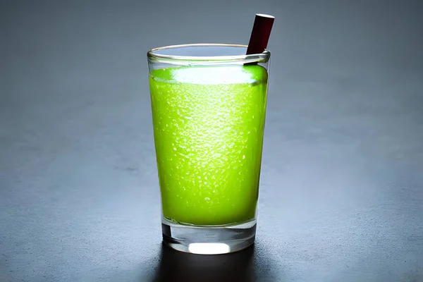 photo of lime juice in a glass under studio lighting, lime juice closeup