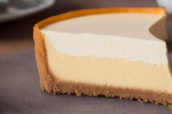 Cheesecake 'in resmi, tatlı ve şekerli pişmiş yemek, lezzetli yüksek kalorili yemek.