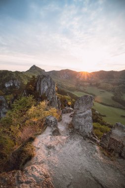 Sunrise at Sulov Rocks in eastern Slovakia. Rough, untouched landscape with rocks in orange light.