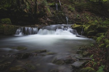 Famous Satiny waterfalls. Breathtaking, untouched nature around the water flowing down cascades creating mini waterfalls. Beskydy mountains, Czech republic, Central europe. Without human intervention.