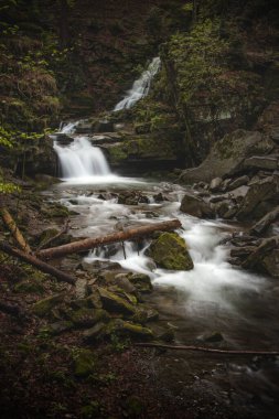 Famous Satiny waterfalls. Breathtaking, untouched nature around the water flowing down cascades creating mini waterfalls. Beskydy mountains, Czech republic, Central europe. Without human intervention.