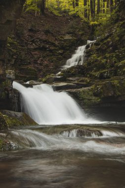 Famous Satiny waterfalls. Breathtaking, untouched nature around the water flowing down cascades creating mini waterfalls. Beskydy mountains, Czech republic, Central europe. Without human intervention.