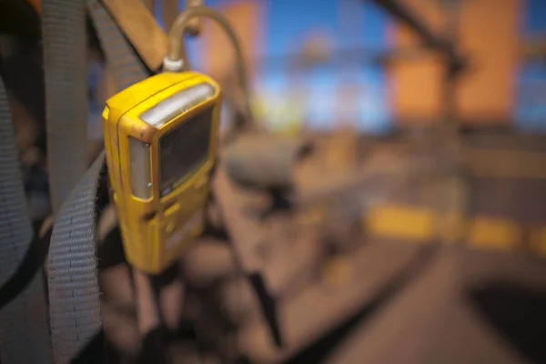Safety work place using gas test detector monitoring at the entry point while rope access welder working as a hot work, welding inside the confined space at construction site, Perth, western of Australia 