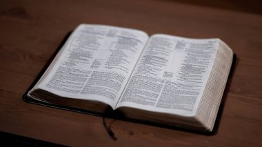 Brown Bible from higher view sitting open on table