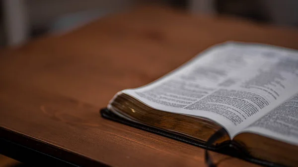 Brown Bible Sitting Wooden Table — Stockfoto