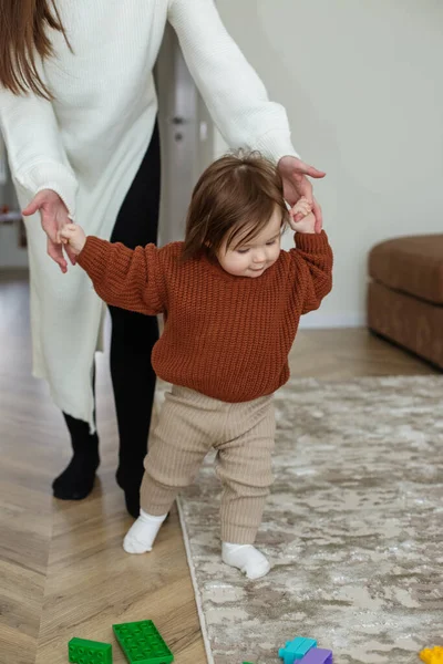 Adorable Baby Holding Mother Hands Little Daughter Walking Living Room — 스톡 사진