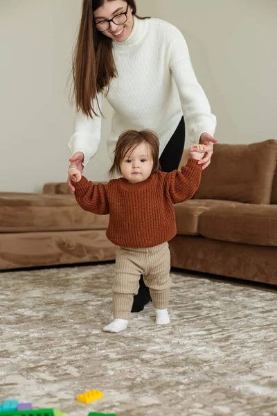 Adorable Baby Holding Mother Hands Little Daughter Walking Living Room — 스톡 사진