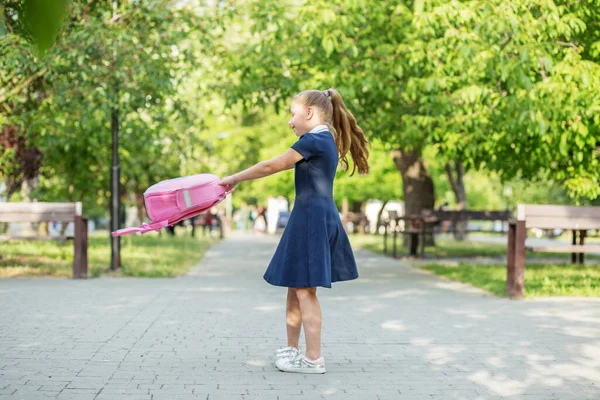 Schoolgirl Goes School Twirls Backpack Children Having Fun Concept Back —  Fotos de Stock