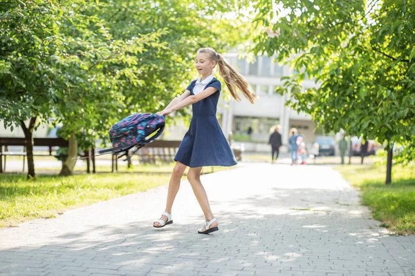 Schoolgirl Goes School Twirls Backpack Children Having Fun Concept Back — Foto de Stock