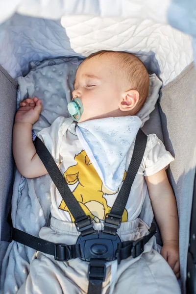 Small Toddler Sleeps Stroller Boy Pacifier — Stock Fotó