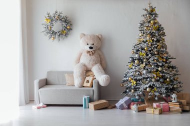 Hediyelerle Noel ağacı Ayıcık çelenkleri