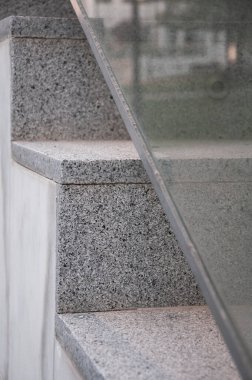 Marble staircase with glass railing
