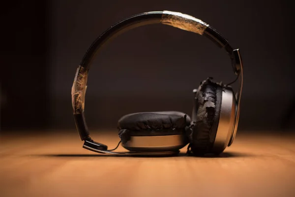 used old headphone blur background