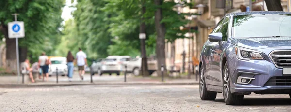 Close up of a car parked illegally against traffic rules on pedestrian city street side — Stock Photo, Image